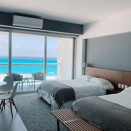 الشقق الفندقية كانكونفي  Ocean Front | Sl المظهر الخارجي الصورة