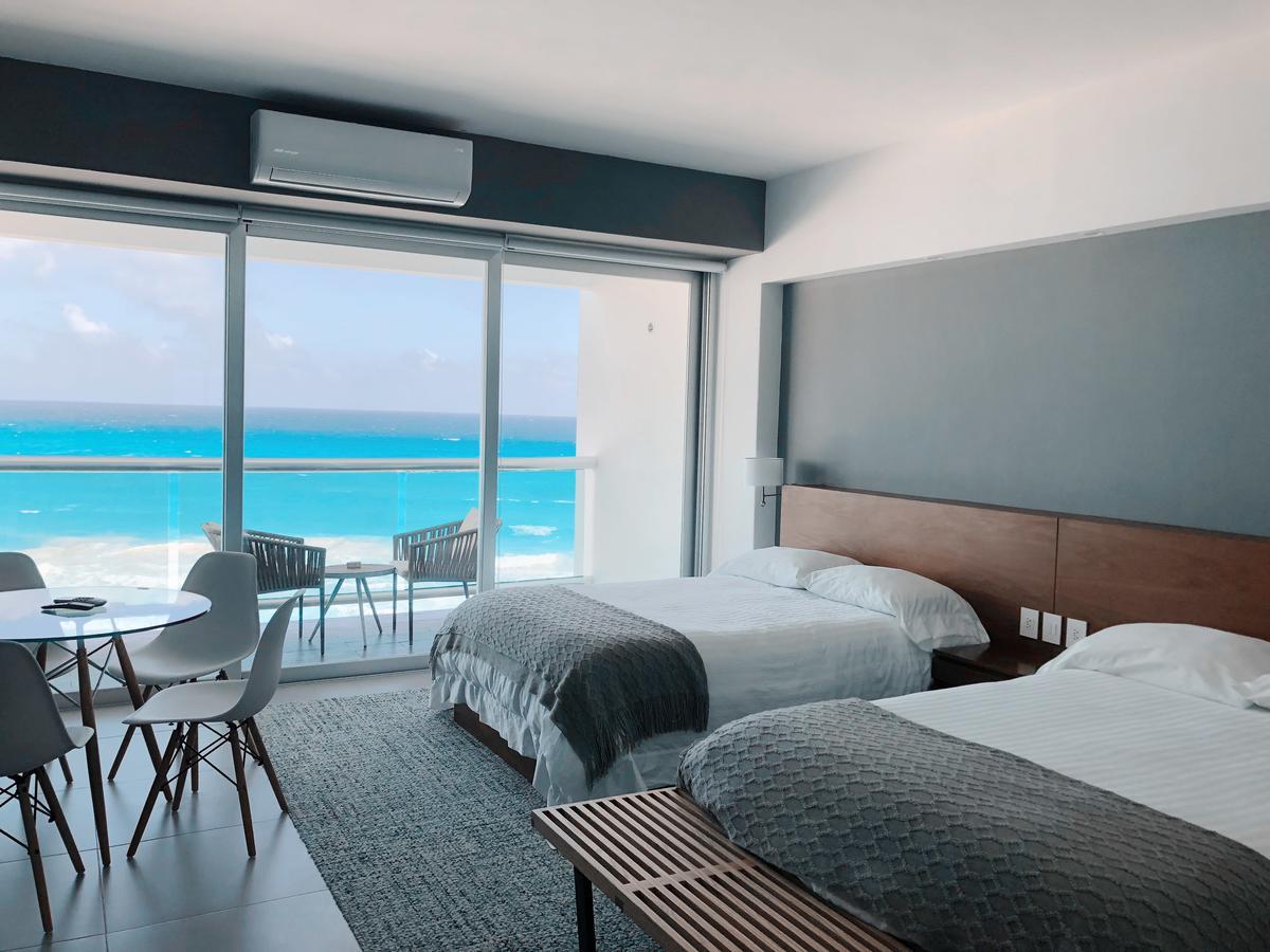 الشقق الفندقية كانكونفي  Ocean Front | Sl المظهر الخارجي الصورة